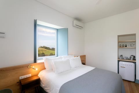 Property building, Bed, Bedroom, Sea view, minibar, air conditioner