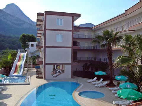 Property building, Day, Natural landscape, Mountain view, Pool view, Swimming pool, sunbed