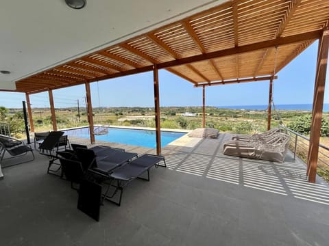 Natural landscape, Balcony/Terrace, Seating area, Pool view, Sea view, Swimming pool, sunbed