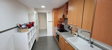 Kitchen or kitchenette, dishwasher, stove