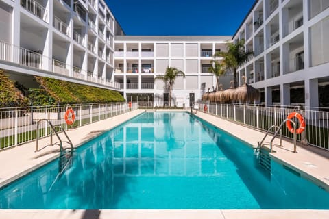 Property building, Day, Balcony/Terrace, Pool view, Swimming pool, Swimming pool, sunbed