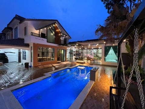 Property building, Patio, Night, Pool view, Swimming pool