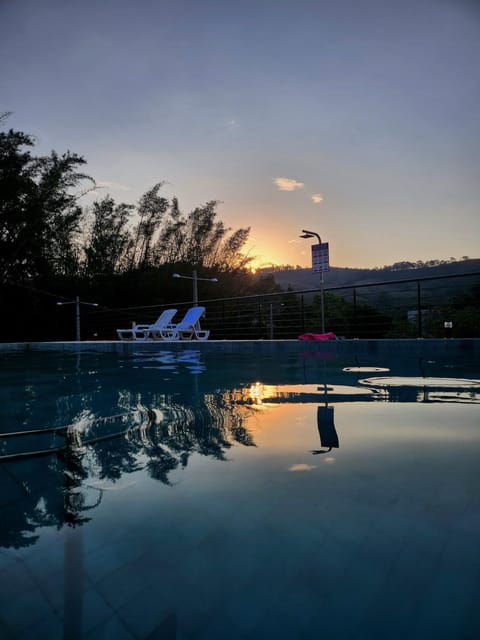 View (from property/room), Swimming pool, Sunset