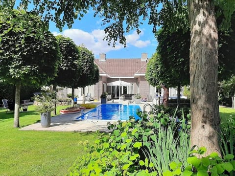 Property building, Day, Garden, Garden view, Pool view, Swimming pool, Swimming pool