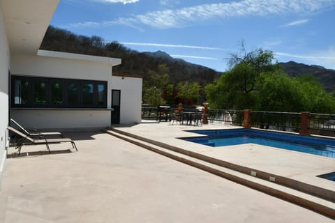 Patio, Day, Mountain view, Pool view, Swimming pool, Swimming pool, sunbed