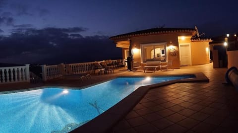 Property building, Patio, Night, Natural landscape, Mountain view, Sea view, Swimming pool, Swimming pool, sunbed