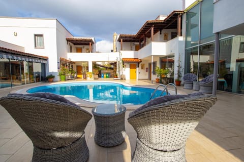 Property building, Patio, Day, Balcony/Terrace, Pool view, Swimming pool, sunbed