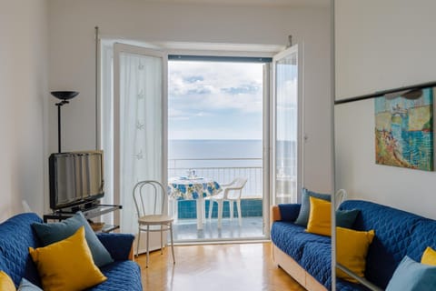 Natural landscape, Living room, Seating area, Dining area, Sea view
