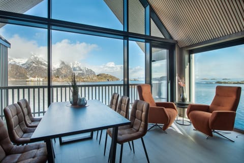 View (from property/room), Balcony/Terrace, Living room, Seating area, Dining area, Mountain view, Sea view