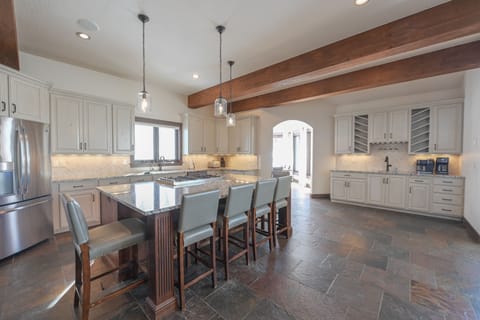 Gather and celebrate around the 6 person kitchen island - the heart of the home