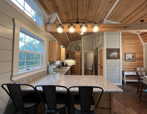 Kitchen buffet with bar stools
