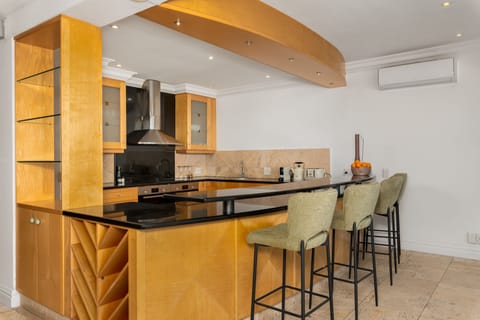 Luxury Apartment | Private kitchen | Full-size fridge, microwave, oven, stovetop