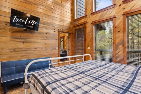 Enjoy the serene ambiance of this beautifully appointed king bedroom, perfect for a luxurious sleep.