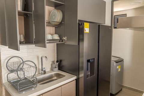 Junior Apartment | Private kitchen | Full-size fridge, microwave, oven, stovetop