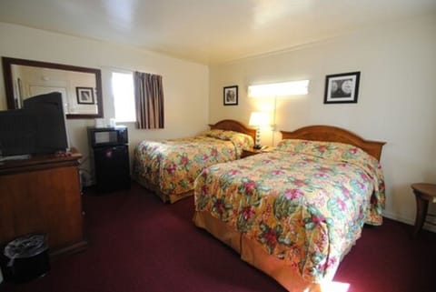 Basic Room, 2 Double Beds | Blackout drapes, iron/ironing board, free WiFi, bed sheets