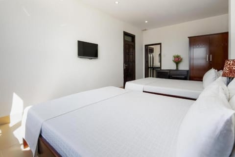 Family Twin Room, City View | In-room safe, desk, laptop workspace, soundproofing