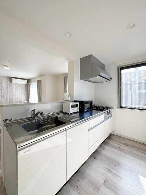 Grand Apartment, 2 Bedrooms | Private kitchen | Mini-fridge, microwave, cookware/dishes/utensils