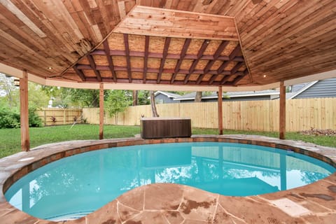 The refreshing pool & covered patio are the perfect chill spot, in any weather.