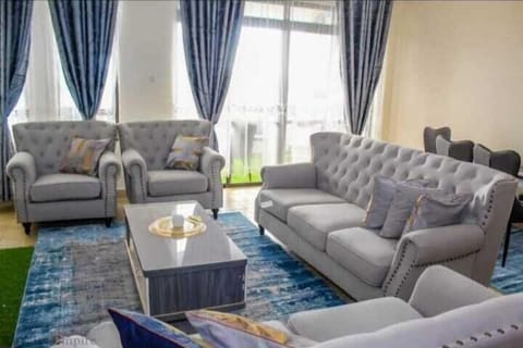 Executive Apartment | Living area | Flat-screen TV