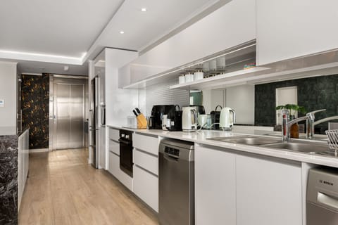 Luxury Apartment | Private kitchen | Fridge, microwave, oven, stovetop