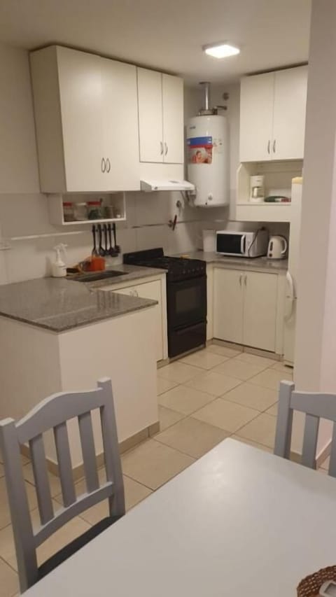 Superior Apartment | Private kitchen | Full-size fridge, microwave, toaster, cookware/dishes/utensils