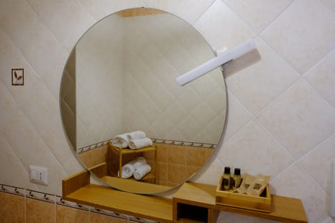 Quadruple Room | Bathroom | Combined shower/tub, hair dryer, slippers, bidet