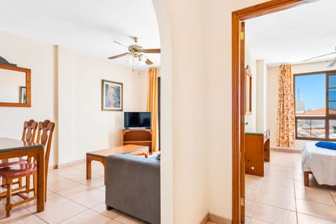 Family Apartment, 2 Bedrooms | Living room | 25-inch flat-screen TV with cable channels, TV