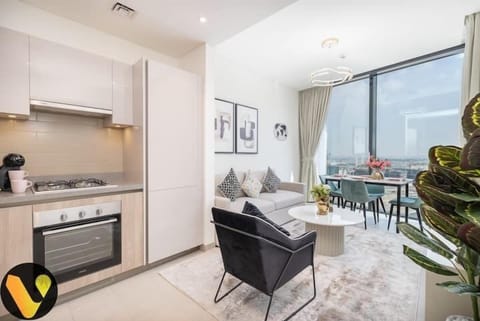 Luxury Apartment | Living area | 65-inch Smart TV with cable channels