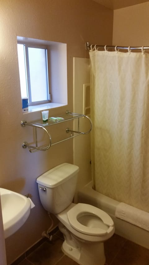 Standard Room, 2 Queen Beds | Bathroom | Combined shower/tub, free toiletries, hair dryer, towels