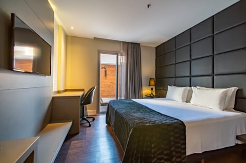 Superior Suite, Hot Tub | In-room safe, desk, free WiFi, bed sheets