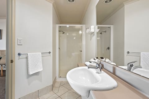 Deluxe Studio | Bathroom | Free toiletries, hair dryer, towels, soap