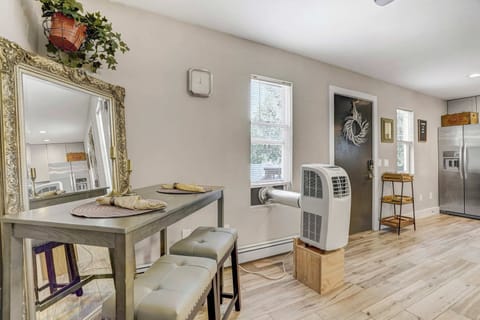 Cozy up in the charming dining nook, perfect for enjoying a meal or a morning coffee