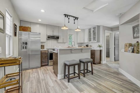 Prepare your favorite meals in this stylish kitchen with stainless steel appliances and ample counter space