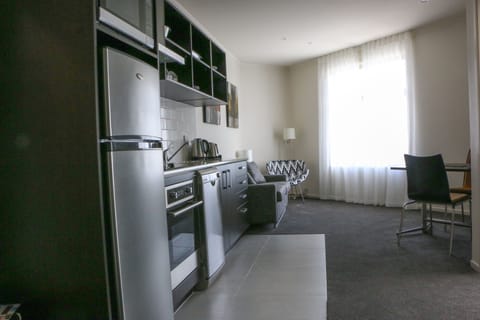 One Bedroom Apartment | Private kitchen | Fridge, microwave, stovetop, coffee/tea maker