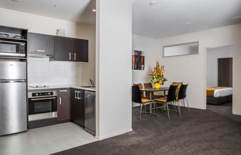 Apartment, 2 Bedrooms | Private kitchen | Fridge, microwave, stovetop, coffee/tea maker