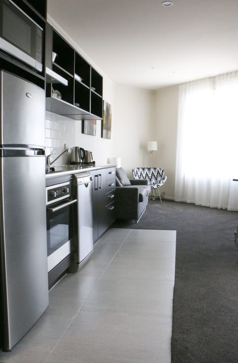 One Bedroom Apartment | Private kitchenette | Fridge, microwave, stovetop, coffee/tea maker