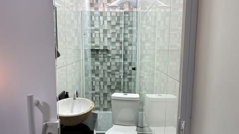 Basic Quadruple Room | Bathroom | Free toiletries, towels, soap, shampoo