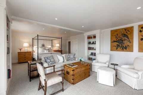 Coatue Suite - King Bed | Living area | Flat-screen TV