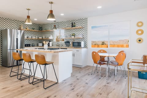 Full amenities kitchen with refrigerator, microwave and toaster