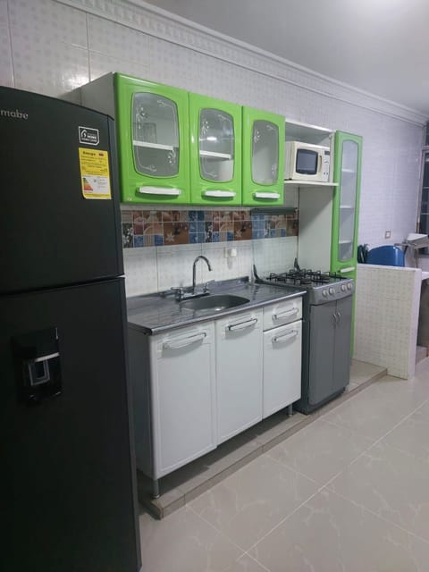 Comfort Apartment | Private kitchen | Full-size fridge, microwave, cookware/dishes/utensils