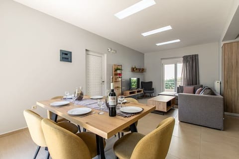 Our spacious living area, seamlessly combining a cozy living room and a dining table, complemented by the added charm of a balcony. This thoughtfully designed space offers a perfect balance between relaxation and entertainment.