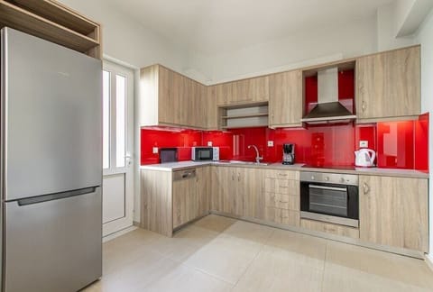 A fully equipped kitchen space where culinary creativity meets convenience.