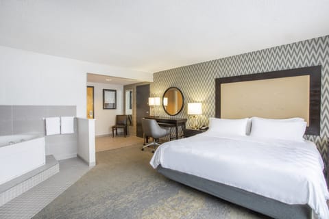 Suite, 1 King Bed, Jetted Tub | In-room safe, desk, laptop workspace, iron/ironing board