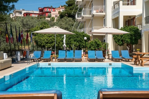 Seasonal outdoor pool, open 9 AM to 3 PM, pool umbrellas, sun loungers