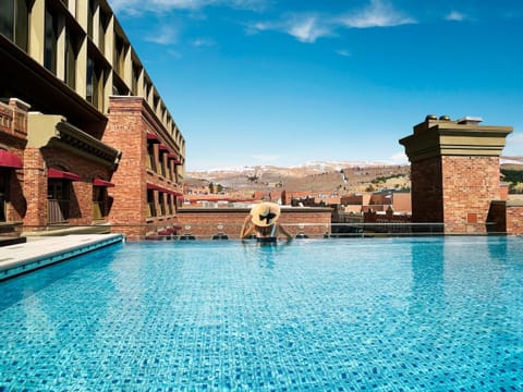 Outdoor pool, open 9:00 AM to 9:00 PM, sun loungers