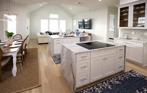 Large custom kitchen with 2 islands and 4 stools