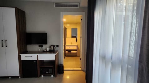 Premium bedding, minibar, in-room safe, blackout drapes