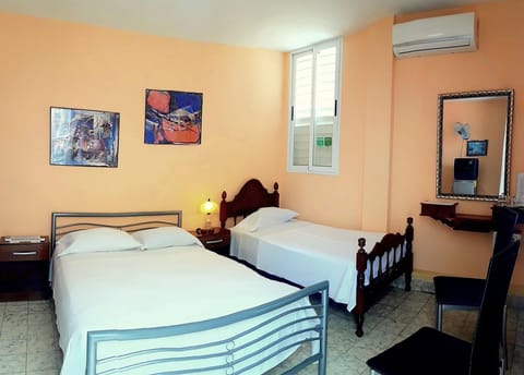 Comfort Triple Room | Minibar, in-room safe, individually decorated, individually furnished