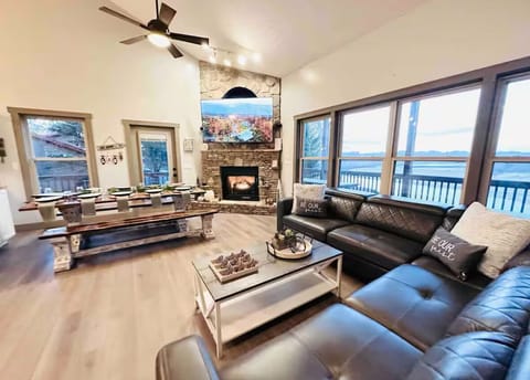 Enjoy the very close lake views in the cozy living room