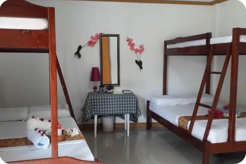 Deluxe Quadruple Room, Garden View | Desk, free WiFi, bed sheets